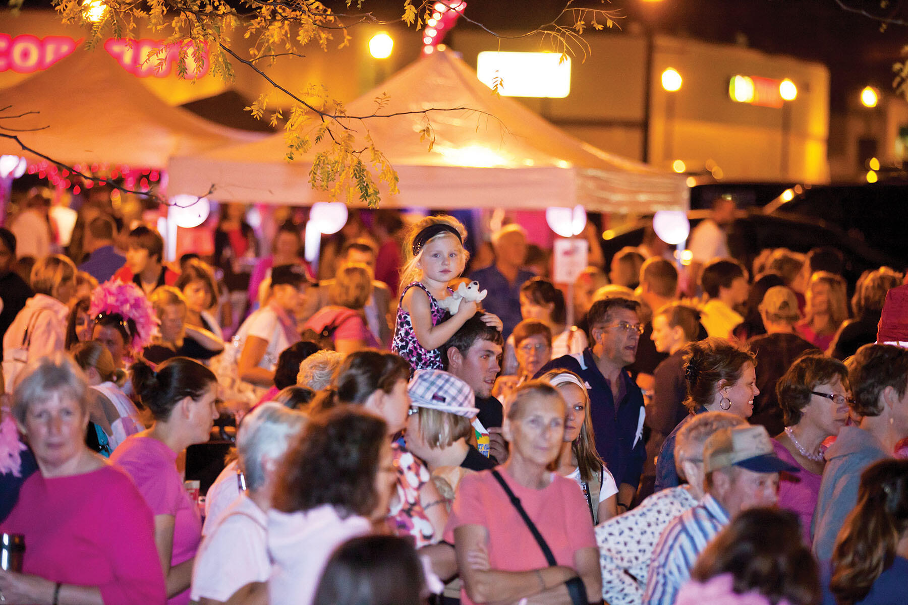 A child stands out amongst the crowd at the 2011 Pink Street Party held in downtown Buffalo. The Street Party’s roots run deep, beginning in the early 2000s and evolving from Sara’s Dance into the Pink Street Party and, ultimately, the Street Party of Hope. (Photos courtesy of Street Party of Hope)