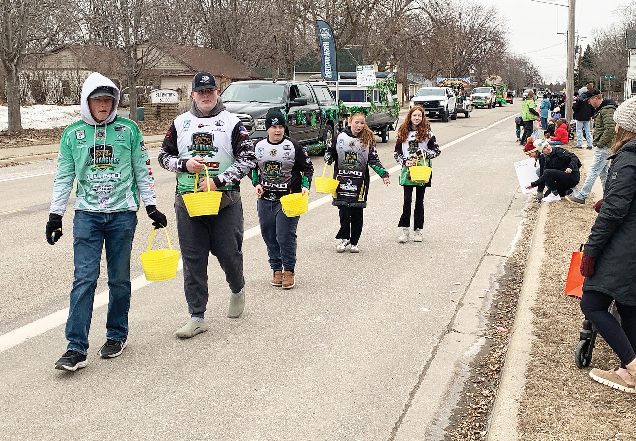 A parade wouldn’t be a parade without yummy treats. These Irish Anglers carried baskets of candy to pass out to children along Division Street.