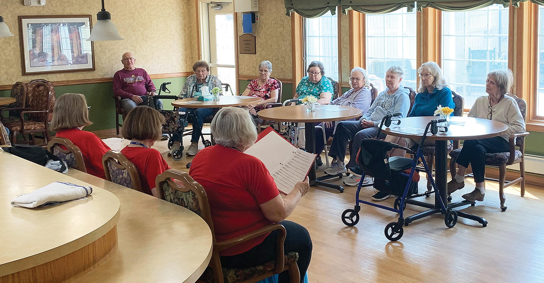 Residents of Park Terrace in Buffalo listened to Readers Theater members perform “All Men are Created Equal” in honor of America’s independence. (Photo by Mike Gesellchen)