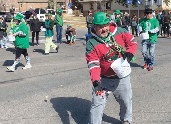 Kids in the crowd were thrilled as parade-route walkers tossed candy by the handful.