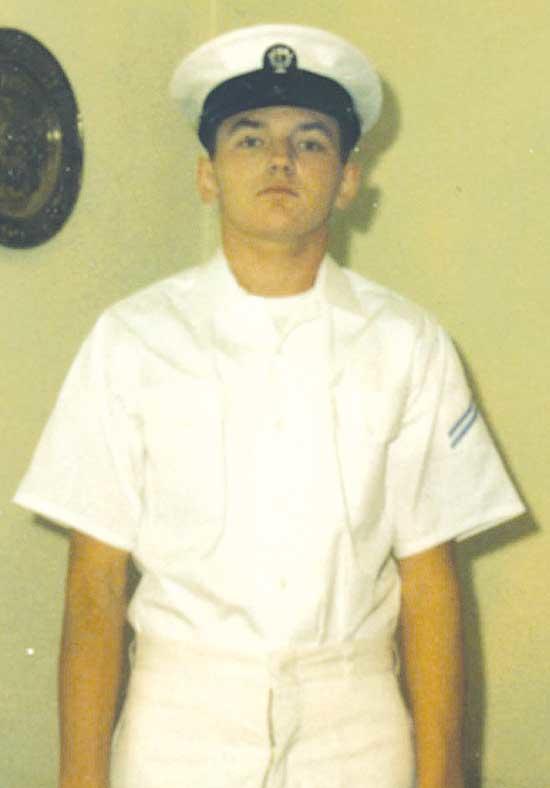 Construction Recruit Edwards home on leave from Boot Camp in September 1974 showing off his summer white uniform for the folks back home.