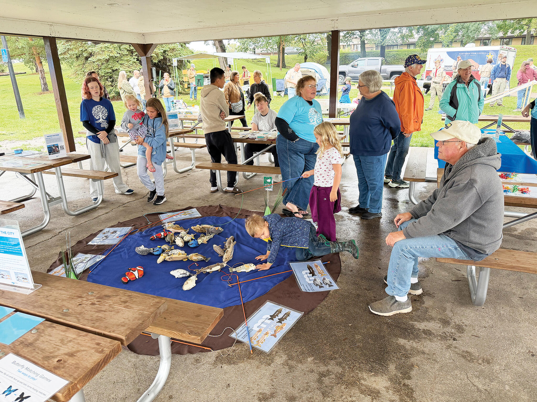 Volunteers with the Science Museum of Minnesota led visitors through a variety of educational and hands-on activities as part of the museum’s “Nature in the Neighborhood” exhibit during The Great Outdoor Fair held at Sturges Park in Buffalo on Saturday, Sept. 19. These youngsters experienced learning about the many fish species found in Minnesota lakes. (Photos by Mike Gesellchen)