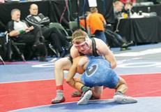 Buffalo’s Ryan Scherber (top) shook off a first-round loss to place fourth in this year’s 132-pound weight class at last weekend’s Class 3A state tourney.